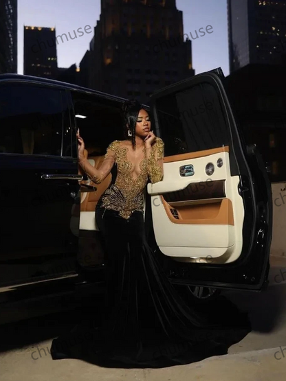 فستان سهرة أسود مخملي بأكمام طويلة 