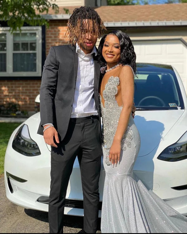 Robe de bal sirène argentée longue sans manches à paillettes et perles